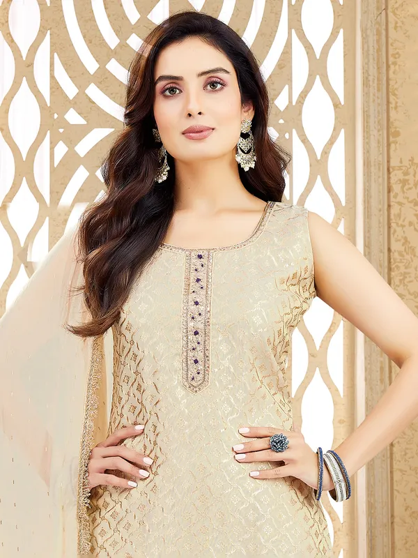 Beige silk salwar suit with cutdana detailing