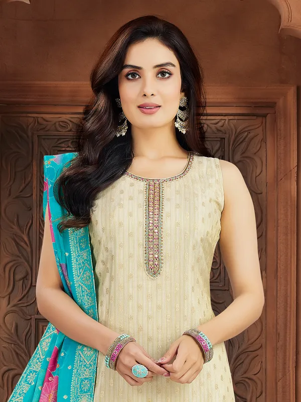 Beige silk salwar suit with cutdana work