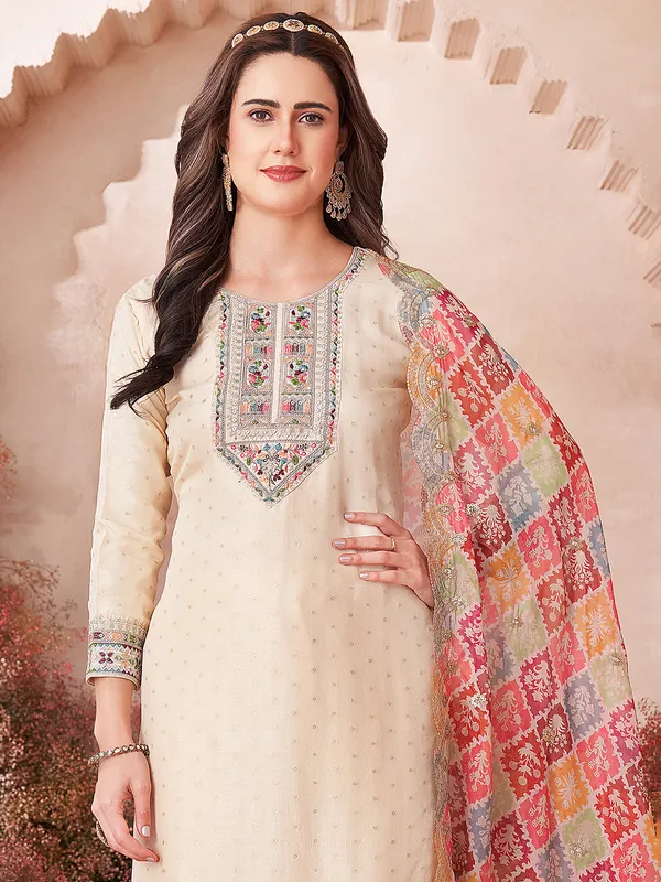 Beige silk salwar suit with multicolor dupatta