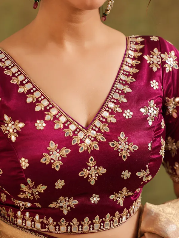 Beige silk saree with bold blouse