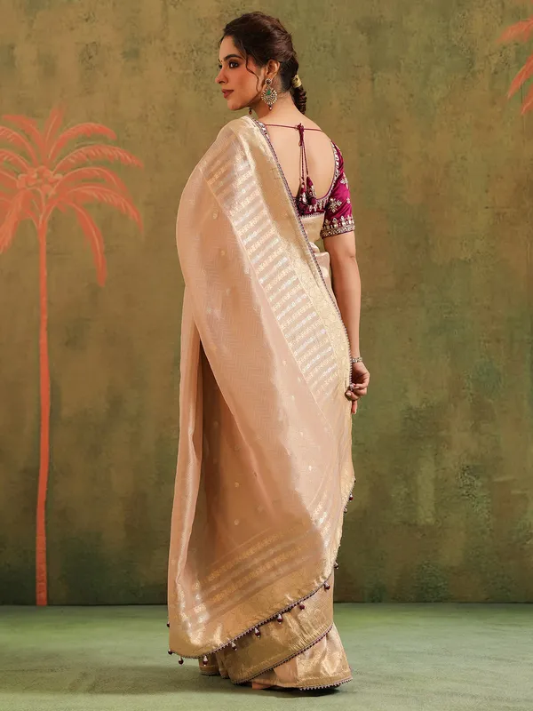 Beige silk saree with bold blouse
