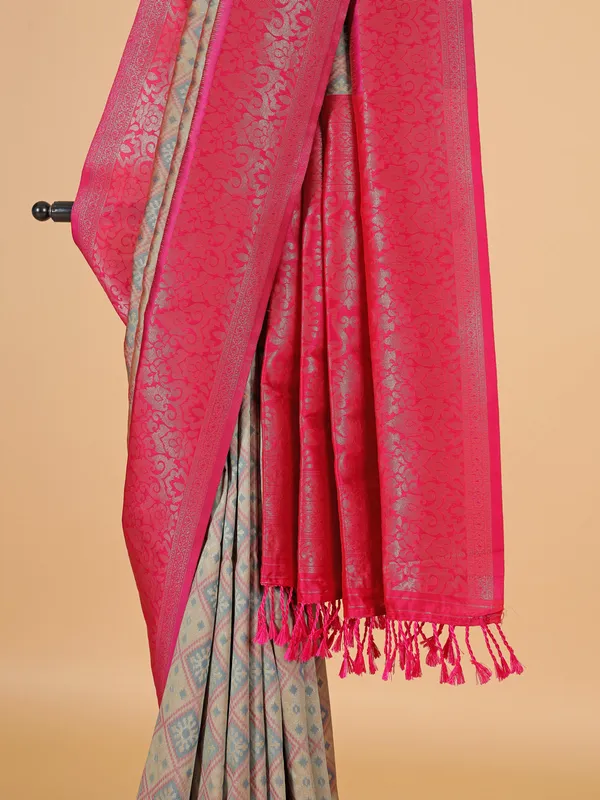 Beige silk saree with bold magenta border