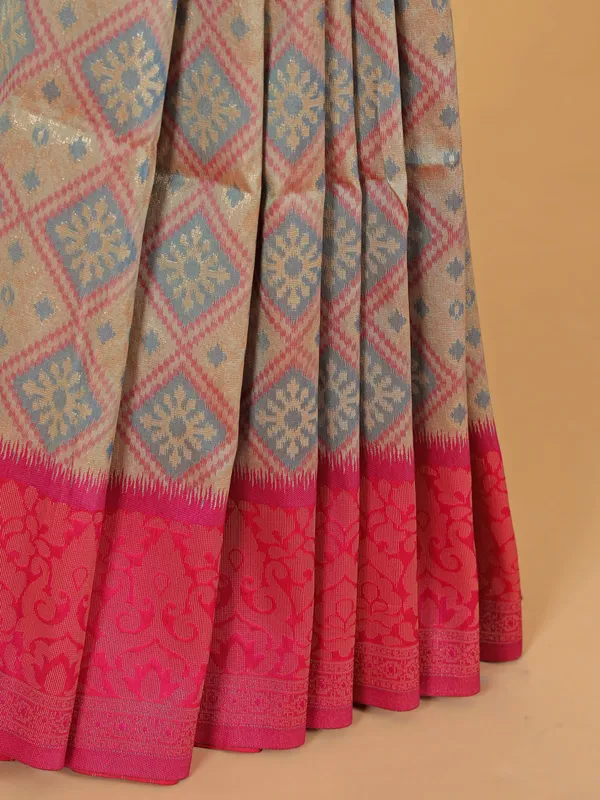 Beige silk saree with bold magenta border
