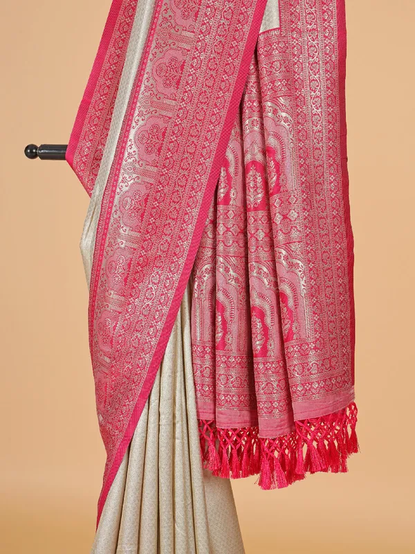 Beige silk saree with bold pink border