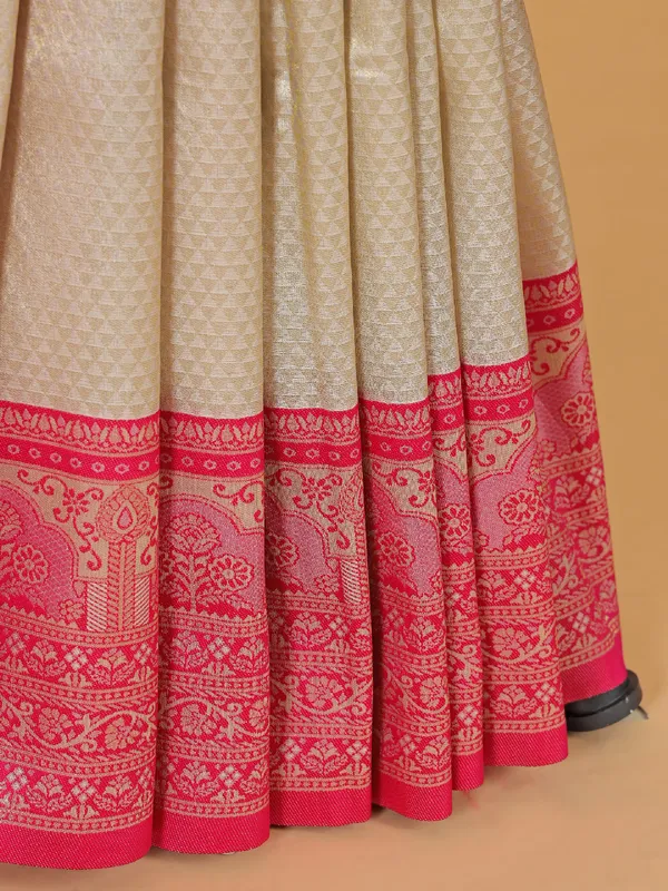Beige silk saree with bold pink border
