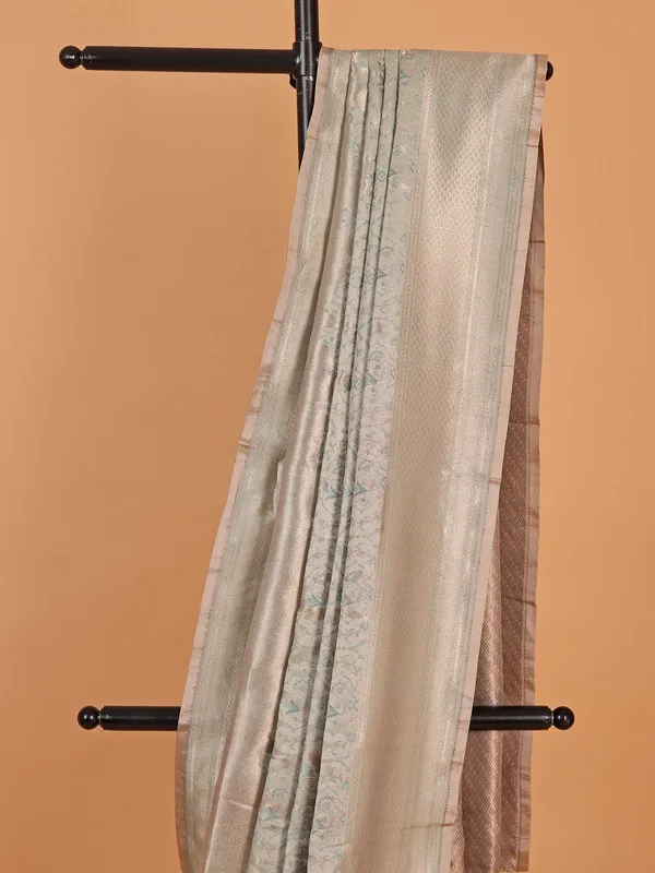 Beige silk saree with golden zari work