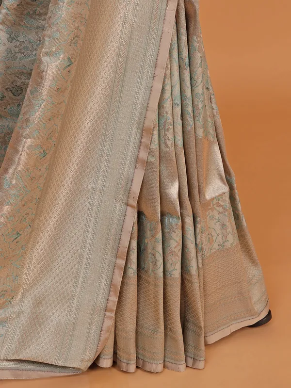 Beige silk saree with golden zari work
