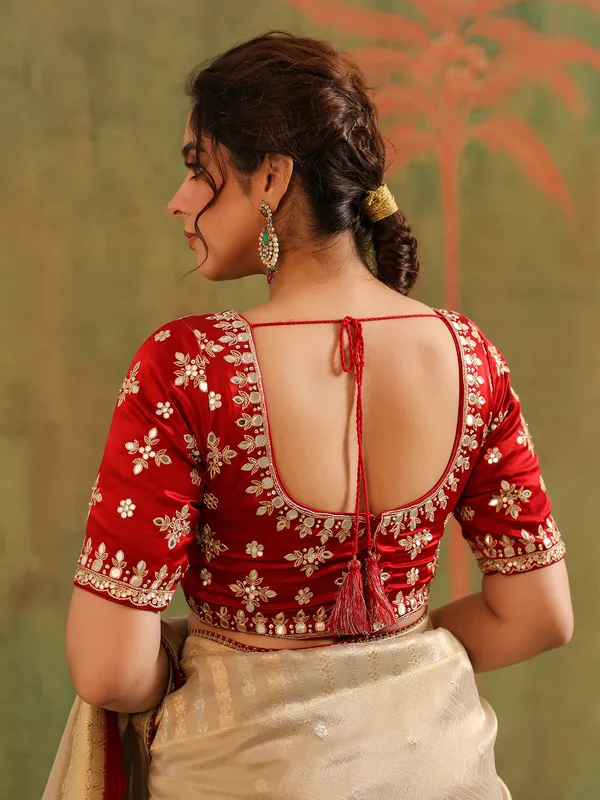 Beige silk saree with maroon contrast blouse festive wear