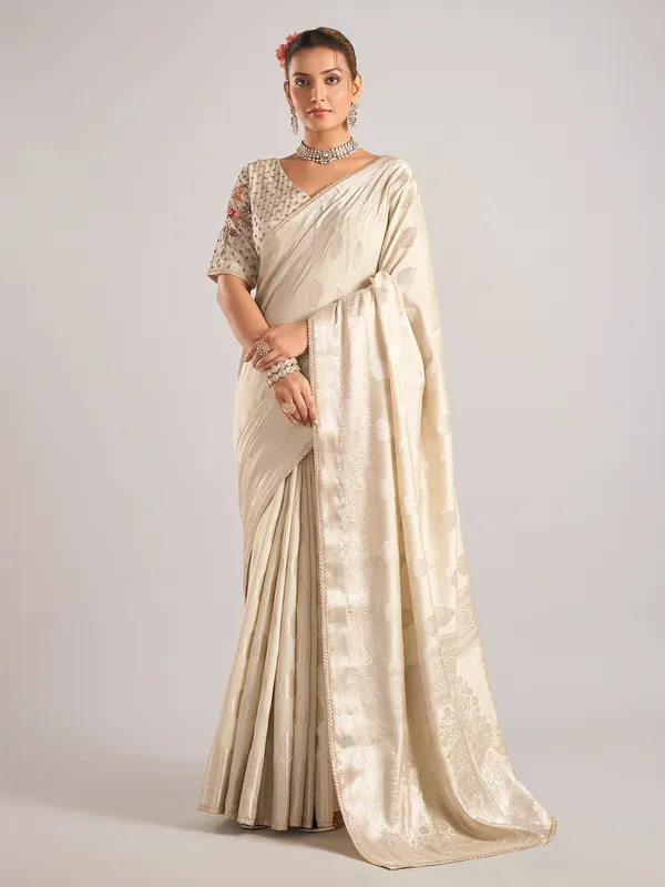 Beige silk saree with ready made blouse