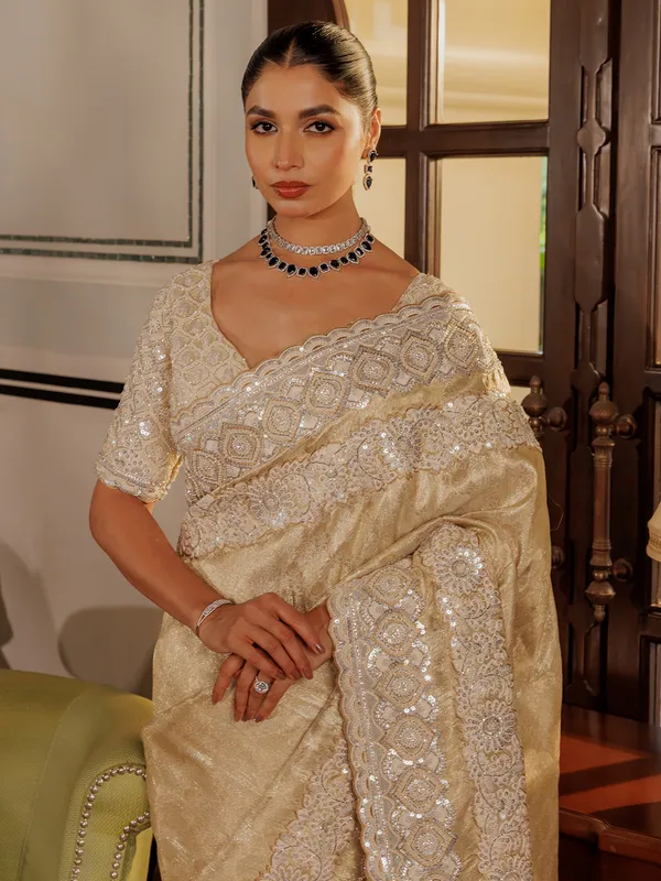 Beige silk saree with sequins work