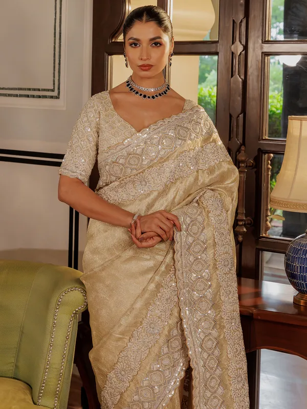 Beige silk saree with sequins work