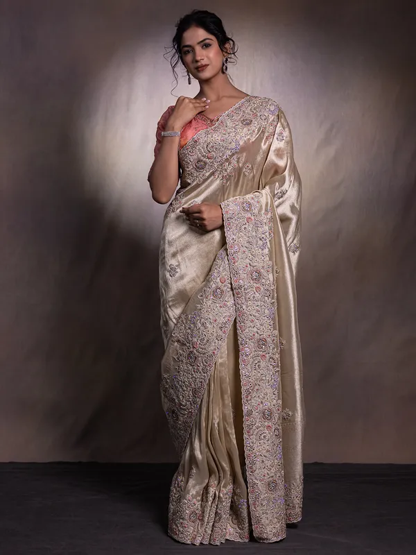 Beige silk saree with zari weaving