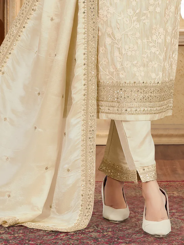 Beige silk suit with zardosi and sequin charm