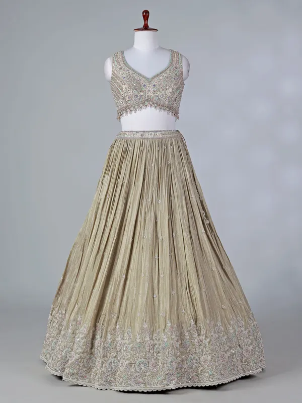 Beige silk sweetheart lehenga choli with sequins work