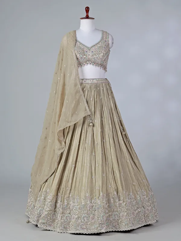 Beige silk sweetheart lehenga choli with sequins work