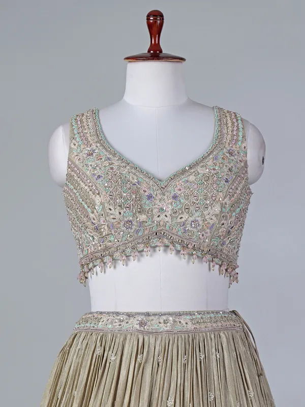 Beige silk sweetheart lehenga choli with sequins work