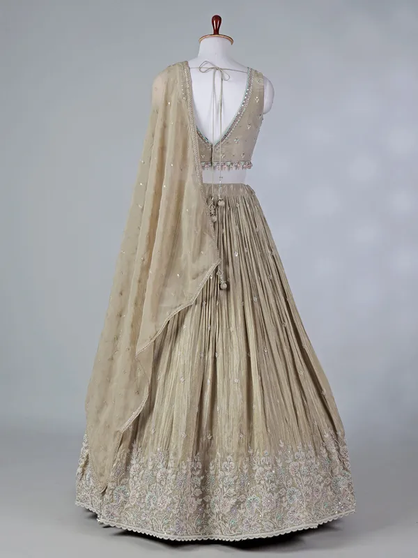 Beige silk sweetheart lehenga choli with sequins work