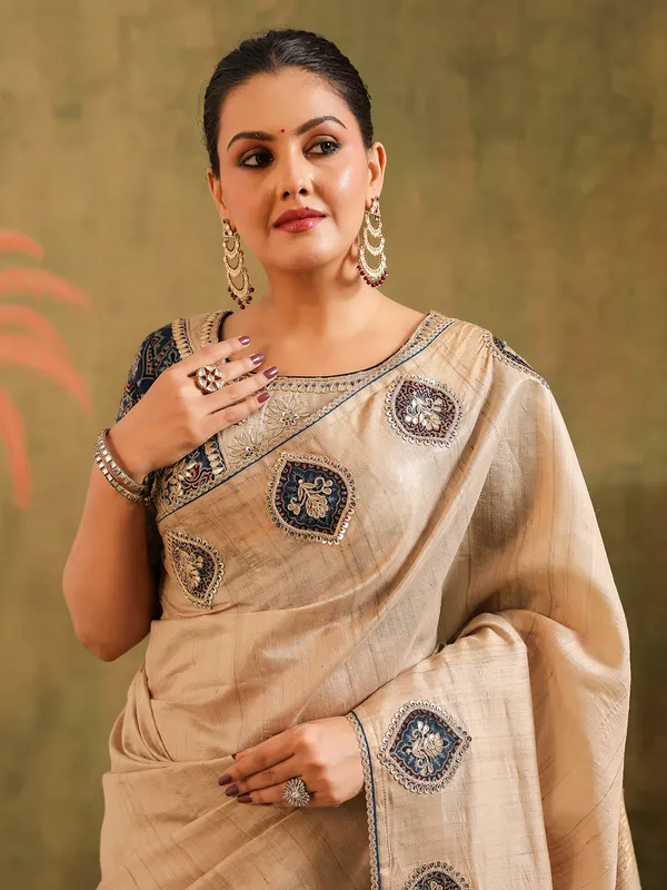 Beige silk thread worked saree for festival