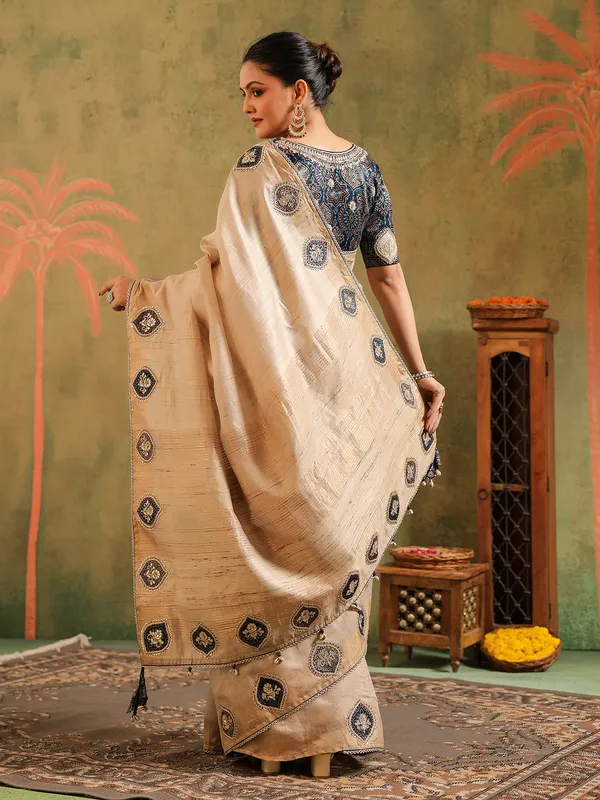 Beige silk thread worked saree for festival