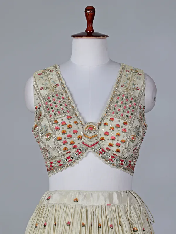 Beige silk V neck lehenga choli with contrast dupatta