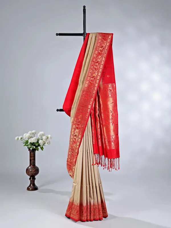 Beige silk wedding saree with traditional zari design