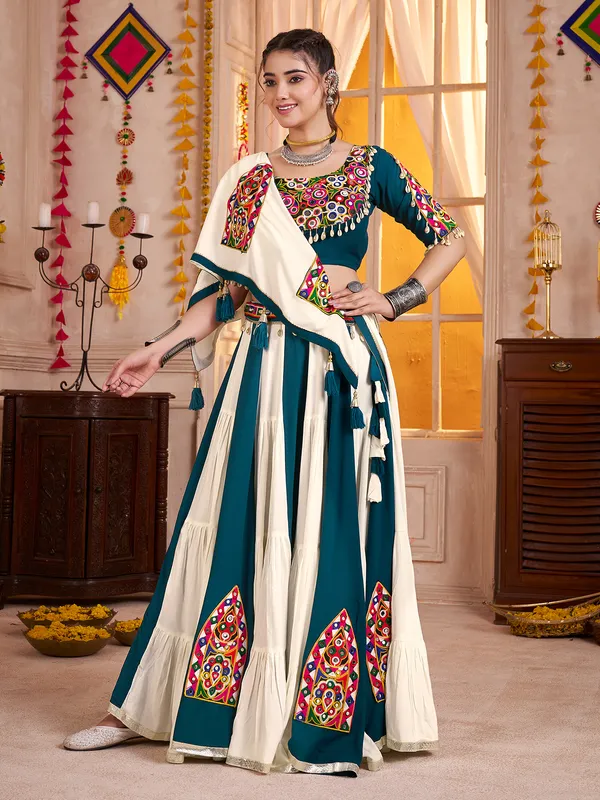 Beige teal blue enchanting navratri chaniya choli