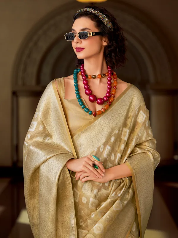 Beige tissue silk festive wear saree