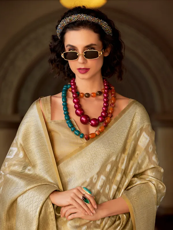Beige tissue silk festive wear saree
