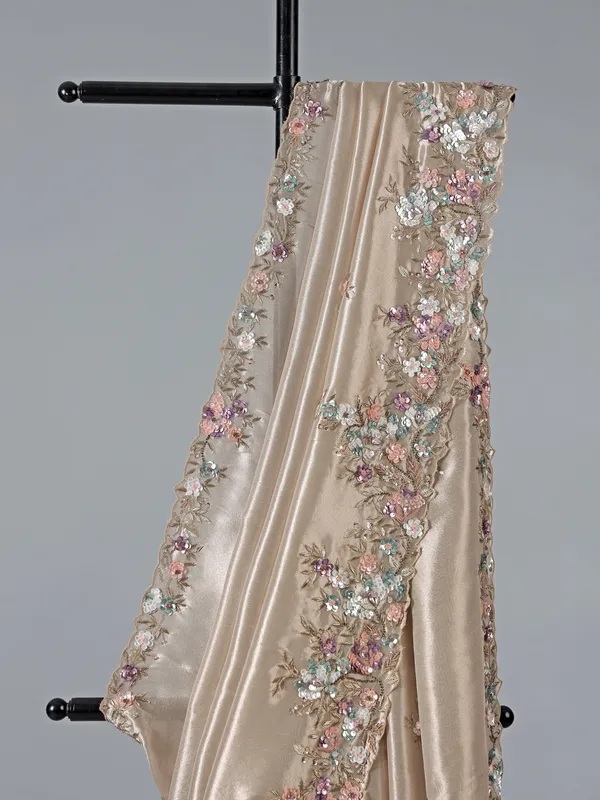 Beige tissue silk party wear embellished saree