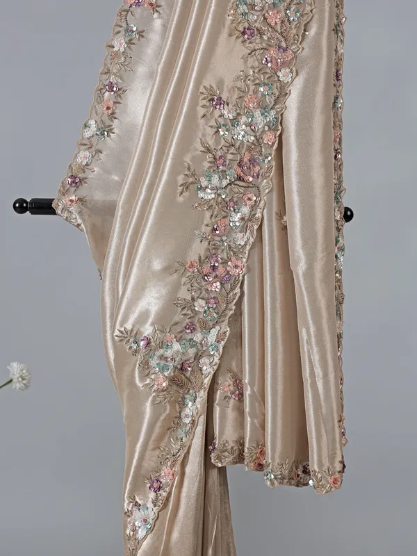Beige tissue silk party wear embellished saree