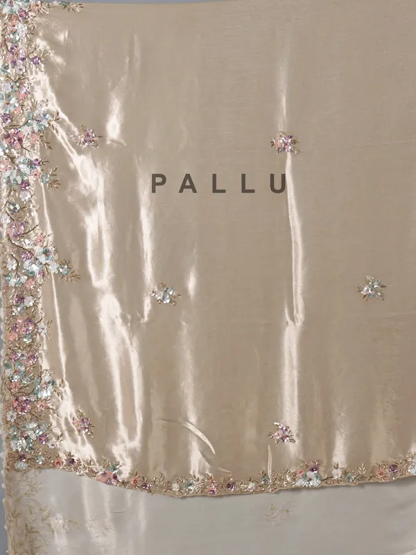 Beige tissue silk party wear embellished saree