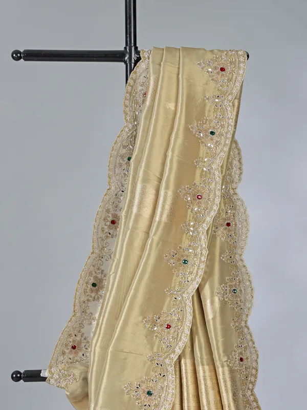 Beige tissue silk saree with diamond highlights