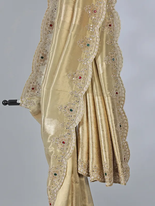 Beige tissue silk saree with diamond highlights