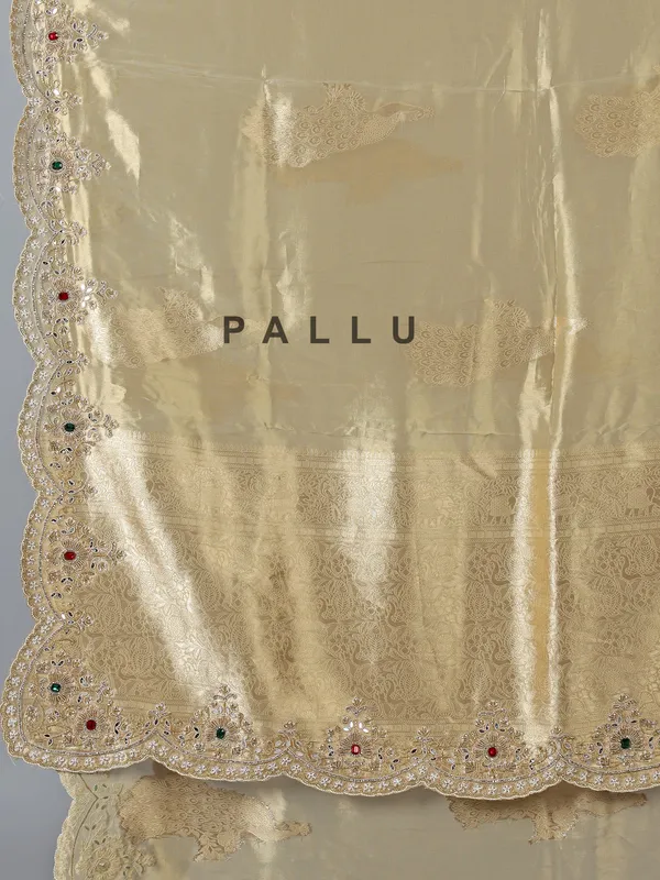 Beige tissue silk saree with diamond highlights