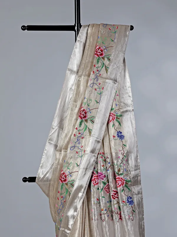 Beige tissue silk saree with thread and zari work