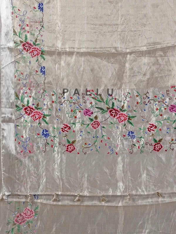 Beige tissue silk saree with thread and zari work