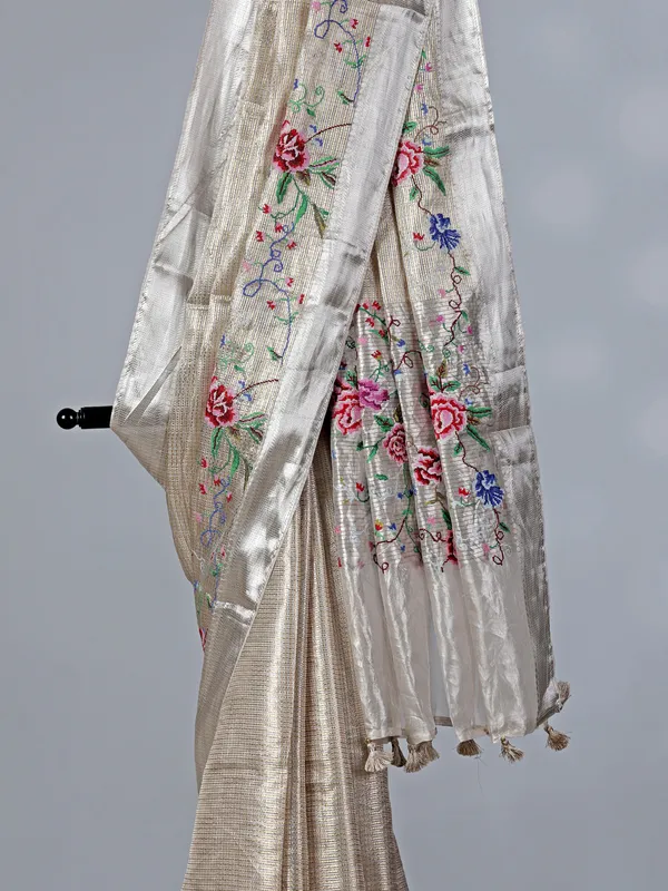 Beige tissue silk saree with thread and zari work