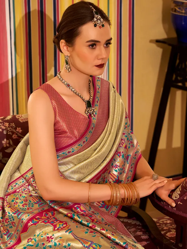 Beige tissue silk saree with zari and prints