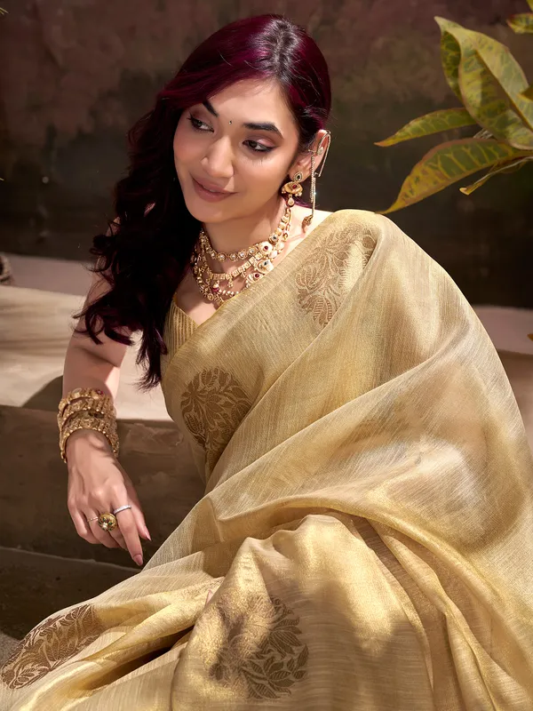 Beige tissue silk saree with zari weaving