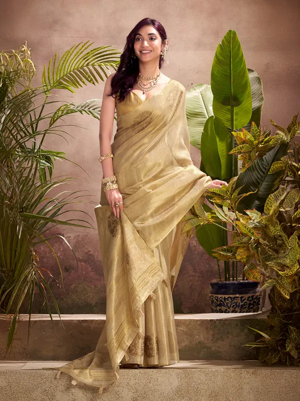 Beige tissue silk saree with zari weaving