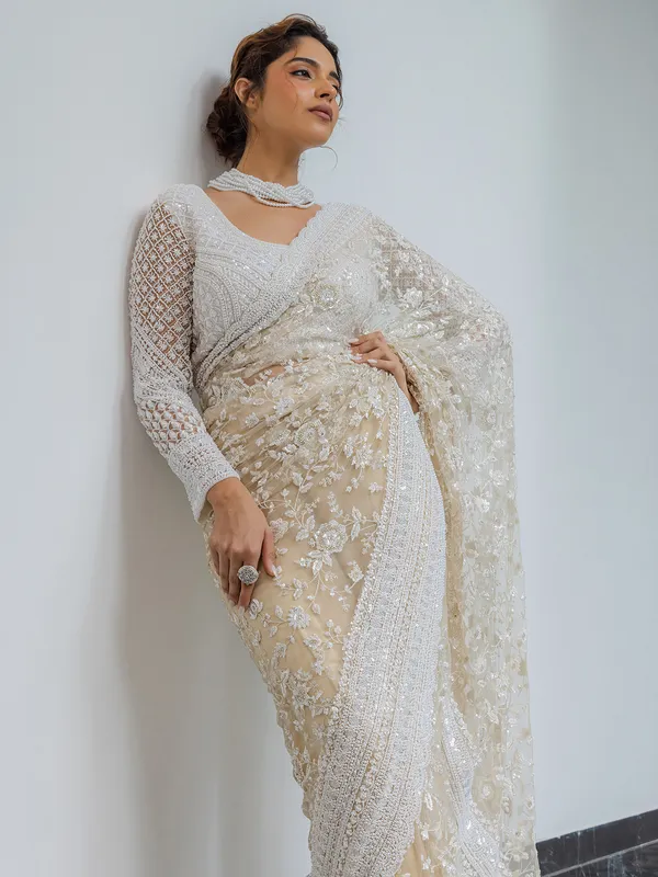 Beige wedding wear saree in soft net