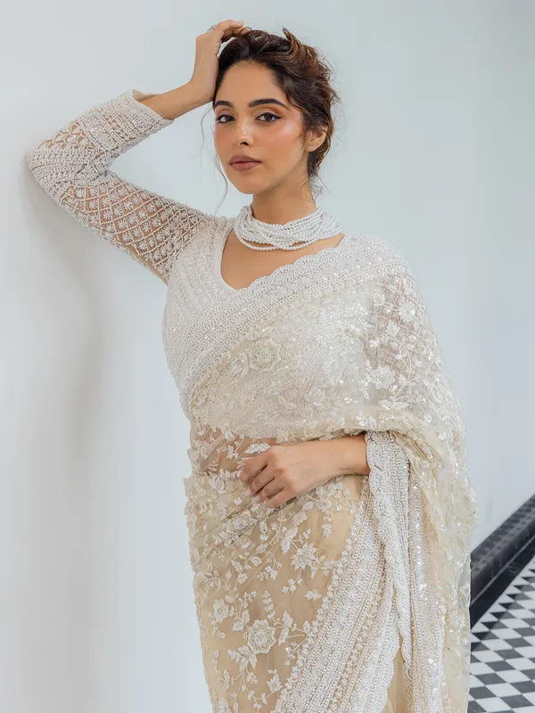 Beige wedding wear saree in soft net