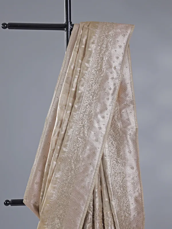 Beige wedding wear silk saree with zari detailing