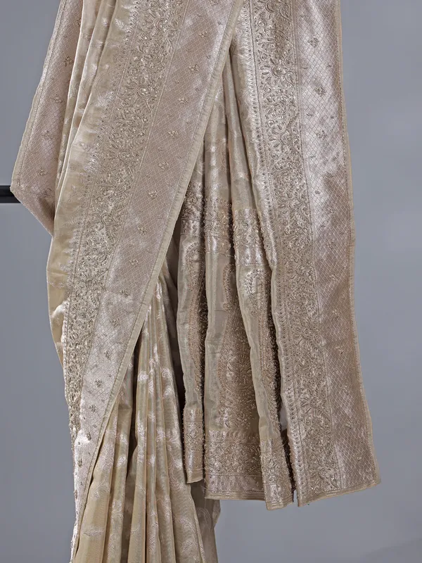 Beige wedding wear silk saree with zari detailing