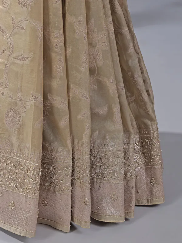 Beige wedding wear silk saree with zari detailing