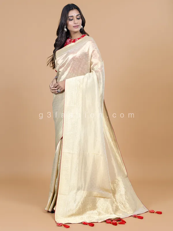 Cream wedding wear tissue silk saree