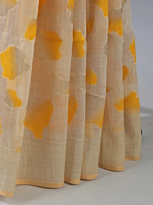 Beige yellow printed zari semi cotton saree
