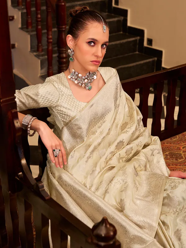 Beige zari worked saree in satin silk