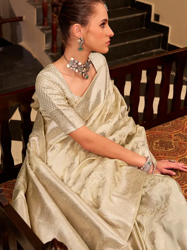 Beige zari worked saree in satin silk