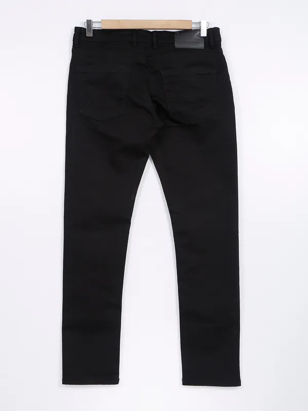 Being Human skinny fit black solid jeans